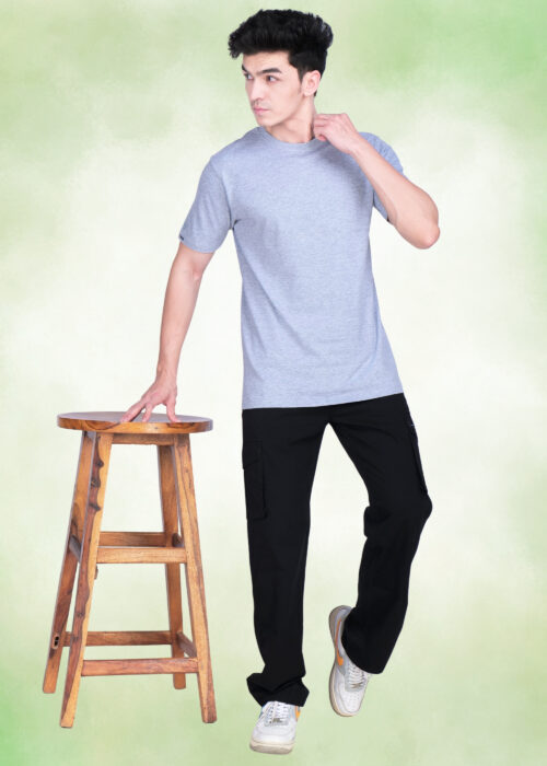 Upgrade your everyday essentials with this men’s grey round neck regular fit T-shirt, designed for a clean and timeless look. Made from soft, breathable fabric, it offers superior comfort for all-day wear. The classic round neck and regular fit make it perfect for casual outings, layering, or daily use. Pair this versatile grey T-shirt with jeans or trousers for a smart, effortless style.