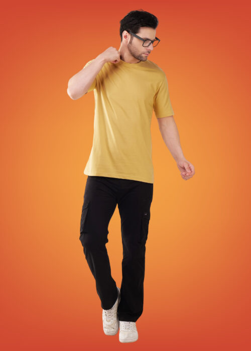 Elevate your everyday style with this men’s round neck beige regular fit T-shirt. Made from soft, breathable fabric, it delivers all-day comfort with a clean, minimal look. The classic crew neck and relaxed fit make it perfect for casual wear, layering, or smart-casual outfits. Pair it with jeans or chinos for an effortlessly stylish appearance. A timeless wardrobe essential for a versatile and refined look.