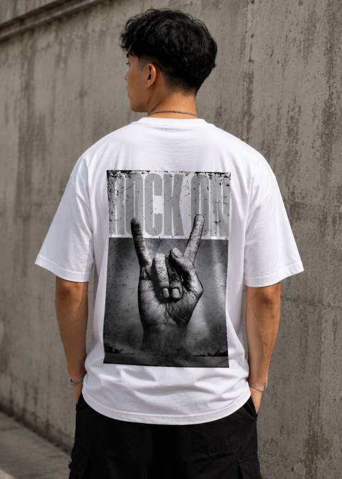Show off your bold streetwear attitude with the STAY WRONG White Oversized Graphic T-Shirt, crafted from 100% premium cotton for superior comfort and breathability. Featuring a minimal “Rock On” front print and a bold monochrome hand graphic on the back, this oversized tee is designed for music lovers and trendsetters who live loud and fearless.